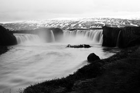 panorama of a huge waterfall in winter