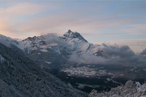 landscape of mountains in the rays of a sunset
