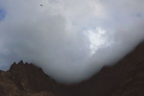 Peak of the mountain in the clouds