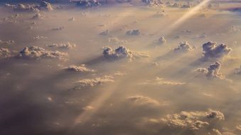 sun rays above the clouds view