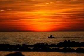 boat on the water during sunset