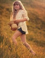 stunningly beautiful girl on the meadow