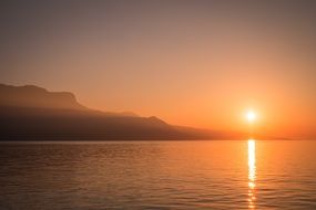 Orange sunrise on the water