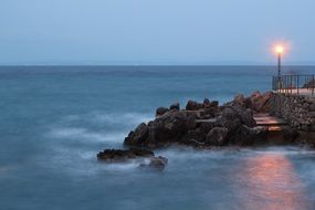 lantern light on the stone coast in Croatia