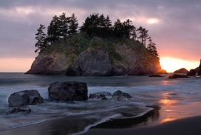 Island on the seascape at dusk