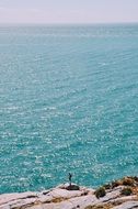 Beautiful and shiny, turquoise water near the rocky coast