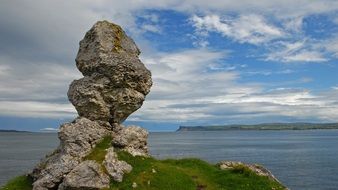 landscape of unusual big stone by the sea in ireland