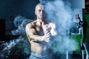 man in the cloud of magnesium powder