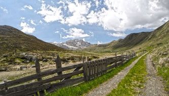 mountains fence sky pathyway