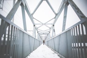 Metal bridge peaceful winter person silhouette