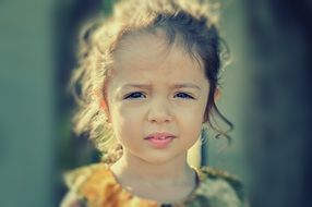 Little girl with a sad look