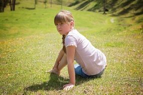 girl posing on the grass