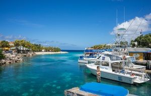 Luxury boats in lagoon curacao island blue