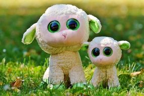 Toy sheeps on the grass