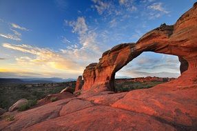 Rock arch on the background of a picturesque sky