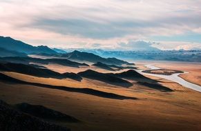 Beautiful and colorful landscape with the prairie with mountains