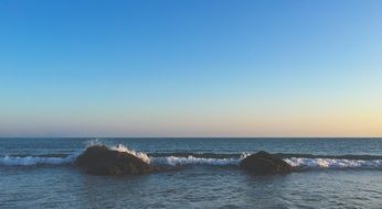 ocean stones on the background of the waves