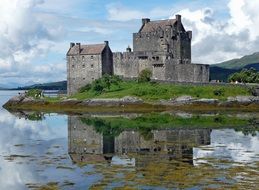 eilean donan castle on the river bank in Scotland