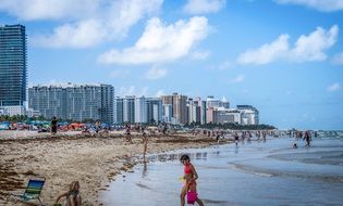 people on the beach in miami