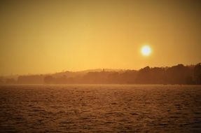 Yellow sunset over the ocean