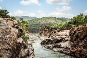 River among the stone gorge, india