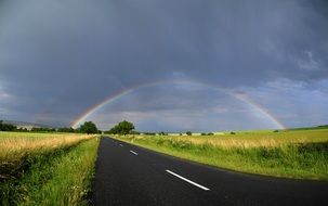 rainbow over a country road in the Czech Republic