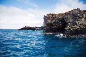 turquoise water and rocky coastline