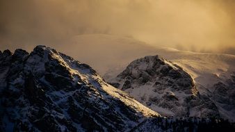 Landscape of the mountain tops at the sunset