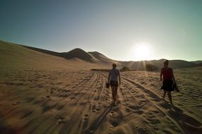 two travelers in the desert