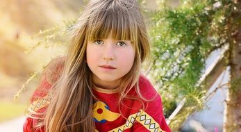 a beautiful girlie with long blond hair