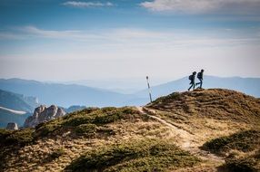 tourists on the mountain with backpacks