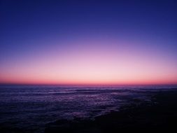 pink and violet sunset on beach view