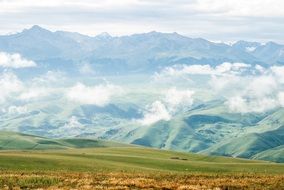 landscape of green valleys and hills