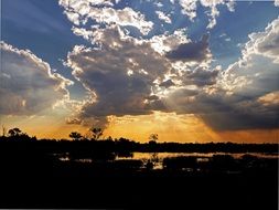 photo of the setting sun on the coast