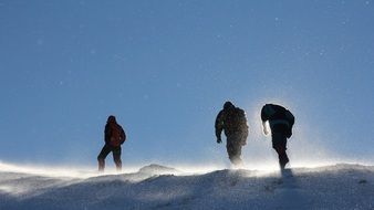 travelers in winter blue mountains frost view