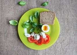 plate of tomatoes and eggs dish