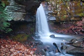 waterfall in the forest in autumn