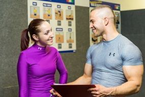 Male with a girl in a bright purple blouse