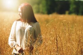 girl in the sunlight on the field