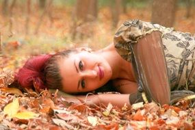 woman in princess dress in the autumn forest