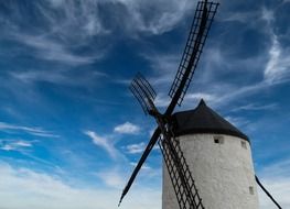 landscape of windmill against the bright blue sky