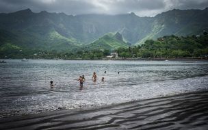 children swimming on the marquesas islands
