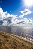 the bright sunny day on the sand beach
