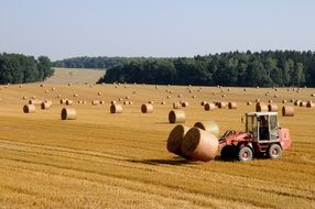 straw bales and tractor