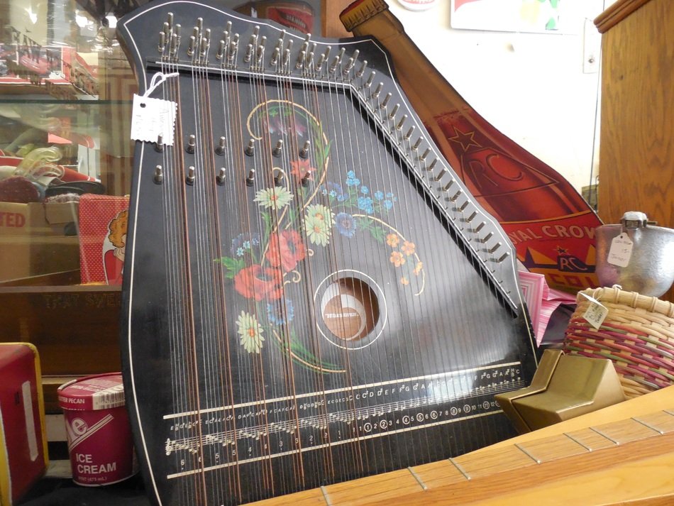vintage painted autoharp on market stall