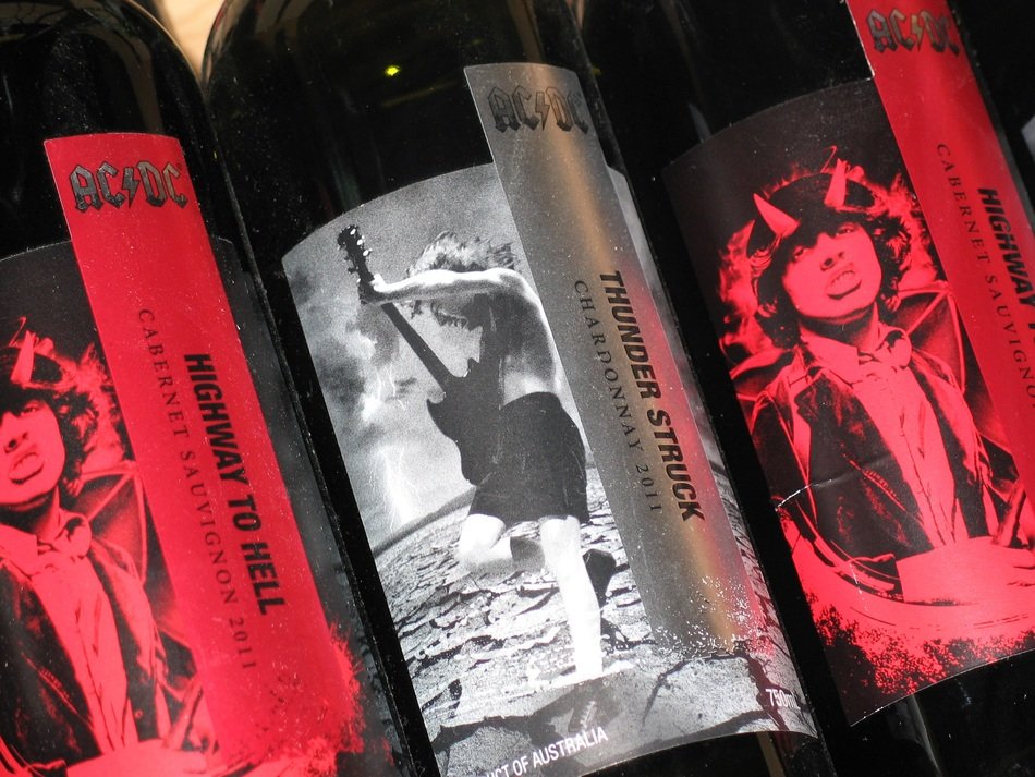 bottles of wine with rock musicians