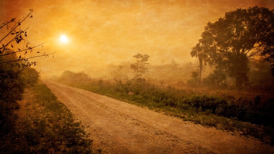 Photo of empty road at sunset
