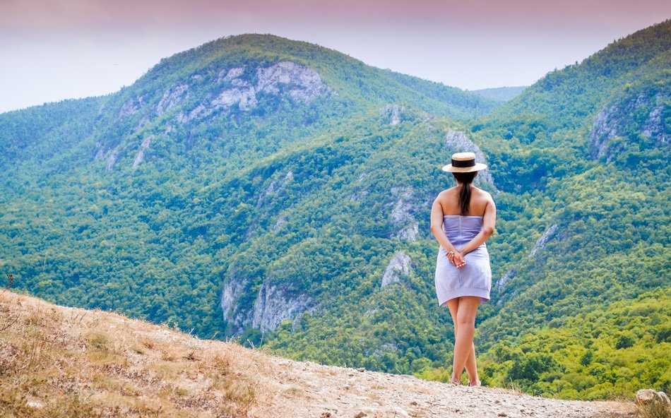 girl in the mountains in summer