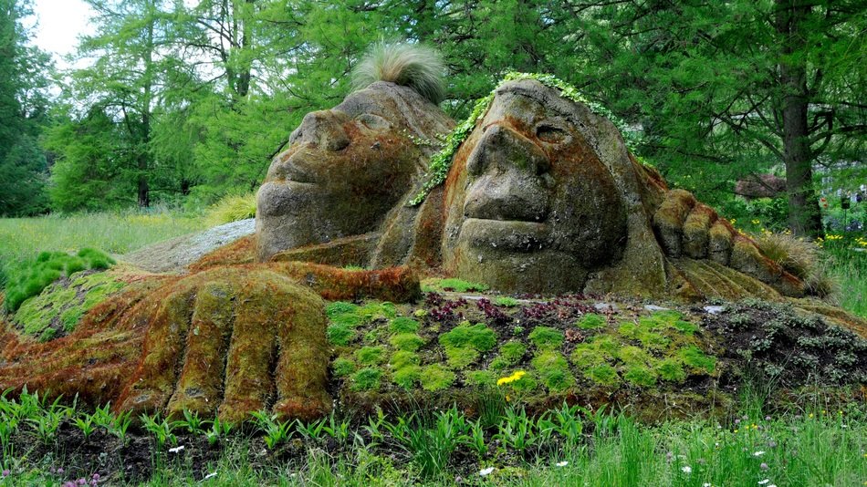 mainau stone figures near forest