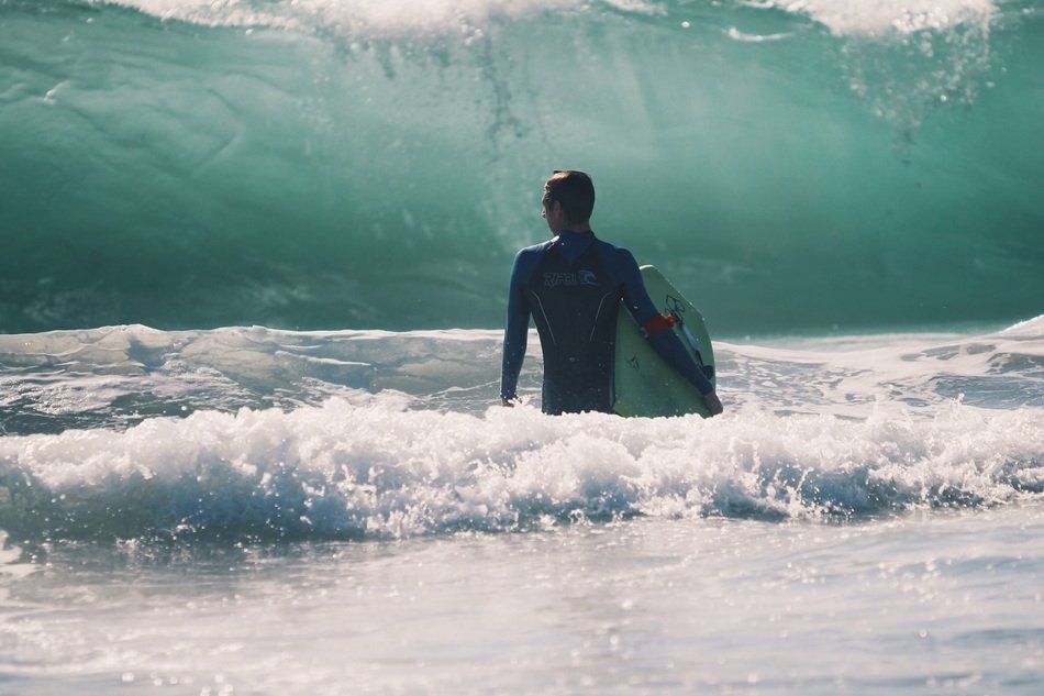 Man in wavy water, hawaii